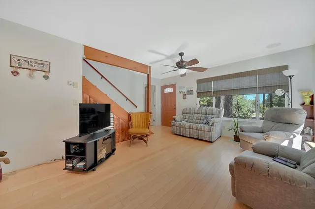 a bed room with a bed and a book shelf