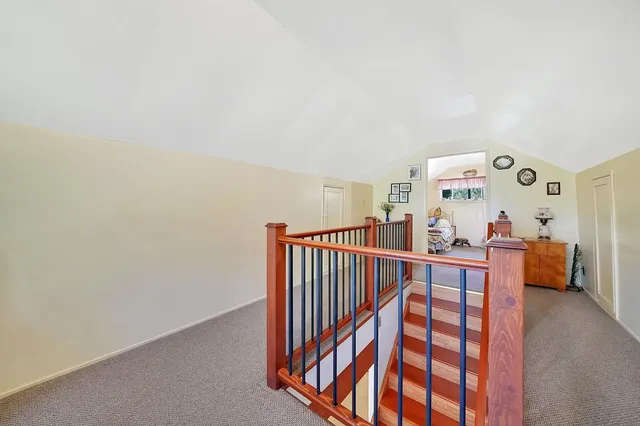 a view of a house with backyard