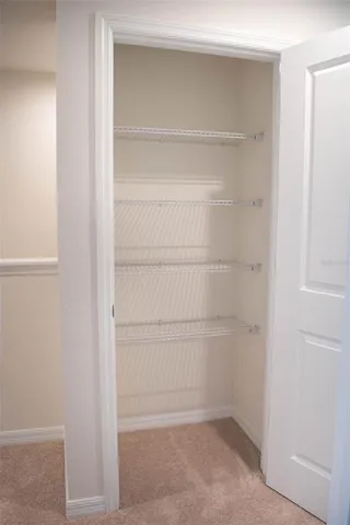 a empty closet with white paint
