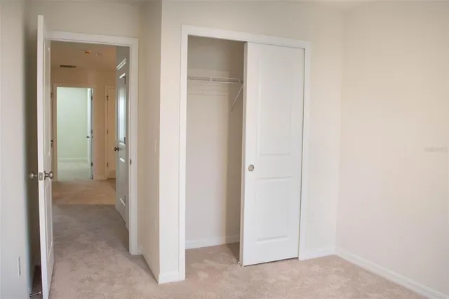 a view of a livingroom from a hallway