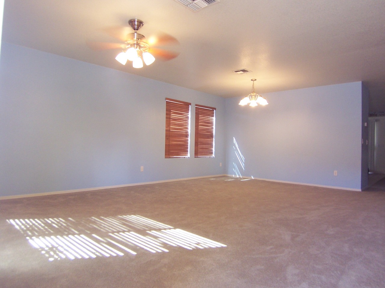 3708 East Sheffield Road Gilbert, AZ 85296 - Photo 3 of 17 Living Room and Dining Room