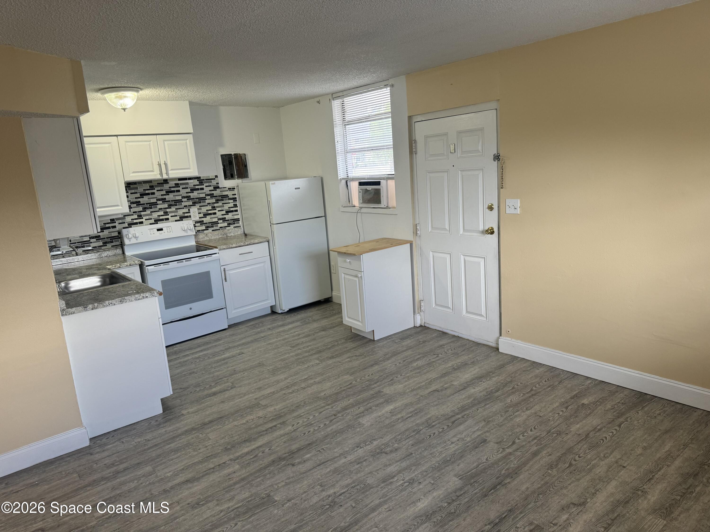 240 Stone Street, Unit 7 Cocoa, FL 32922 - Photo 2 of 11 IMG_5946