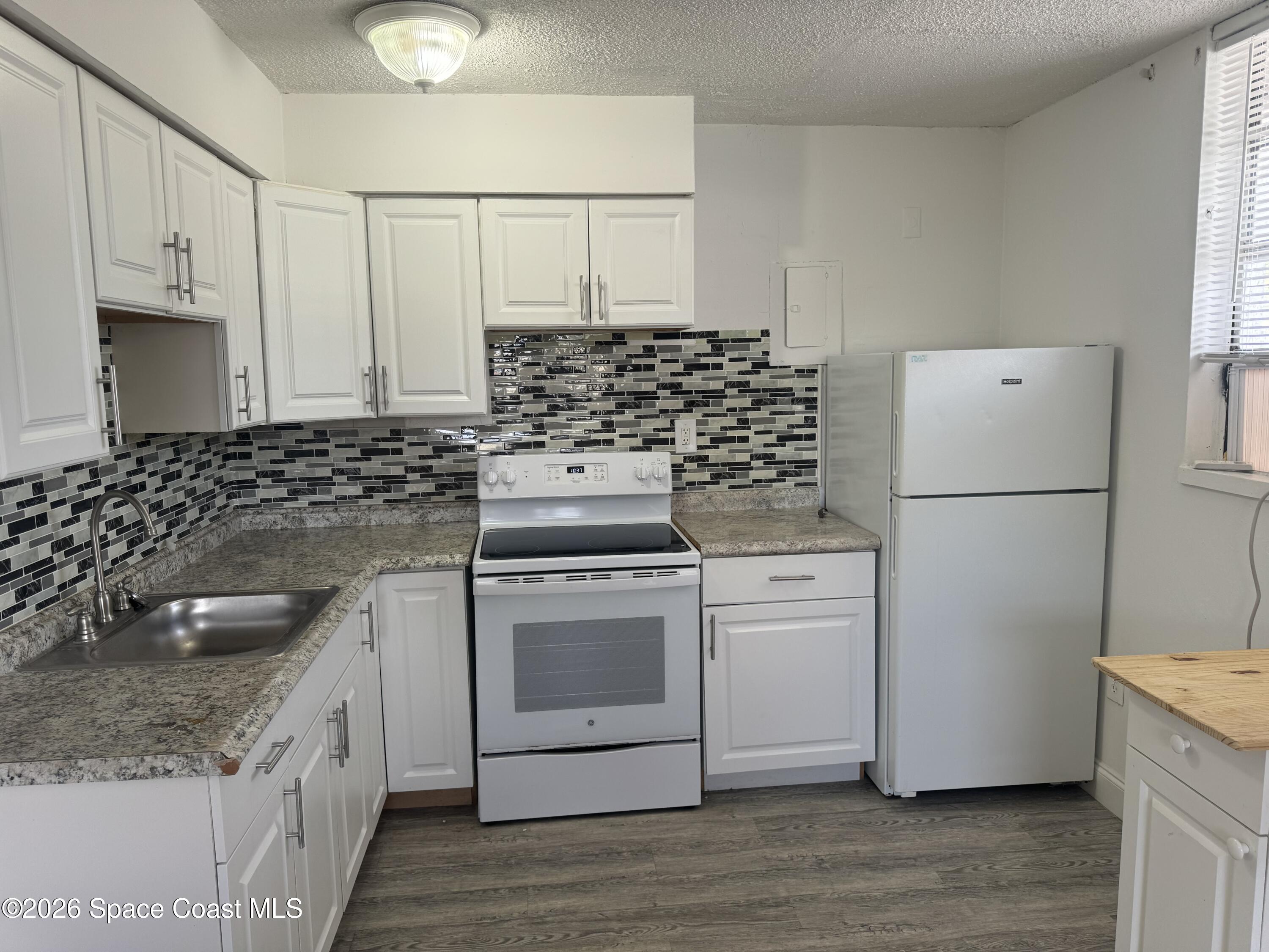 240 Stone Street, Unit 7 Cocoa, FL 32922 - Photo 4 of 11 IMG_5970