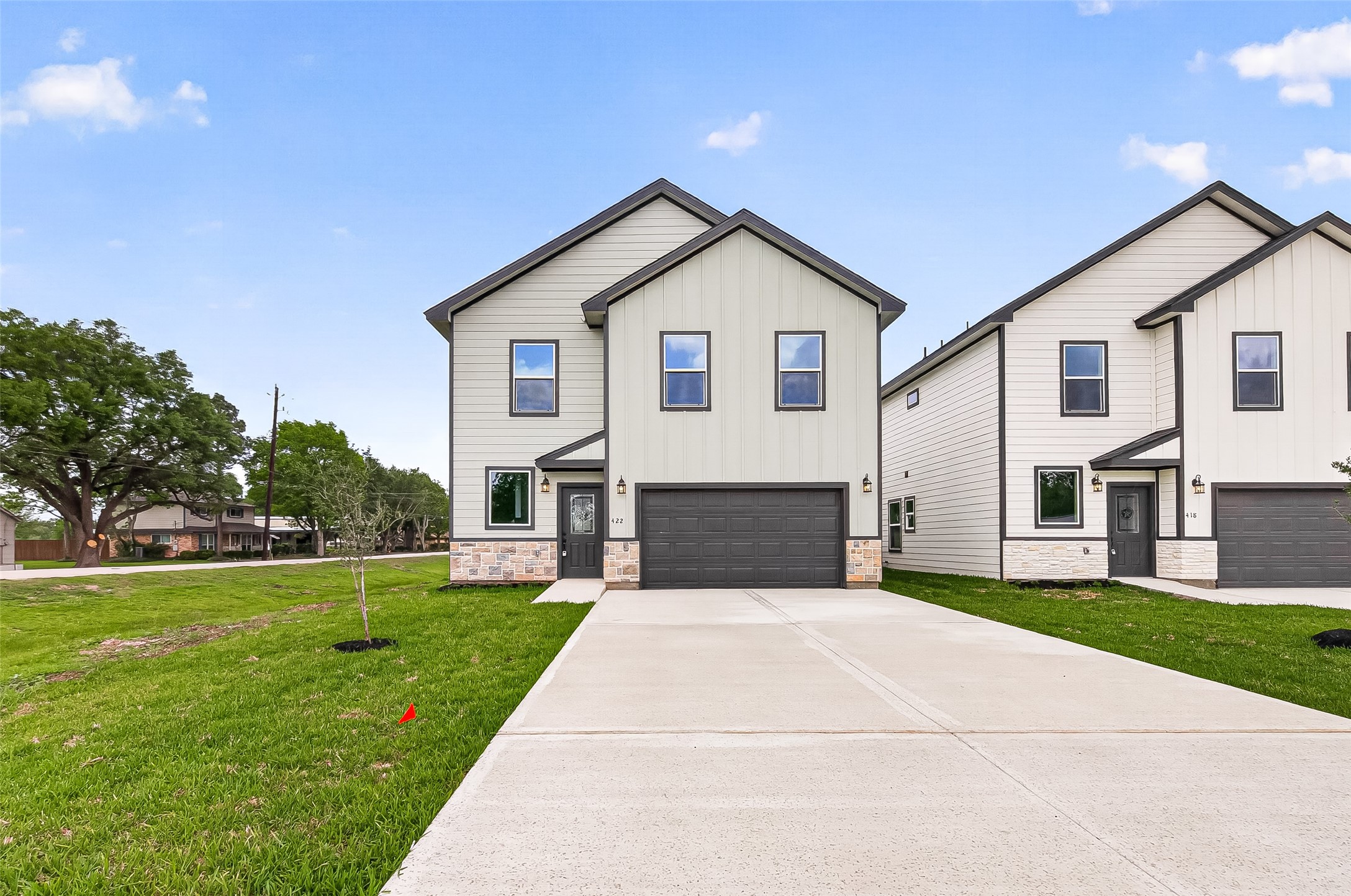 422 North 4th Street Beasley, TX 77417 - Photo 1 of 25 a front view of house with yard and green space