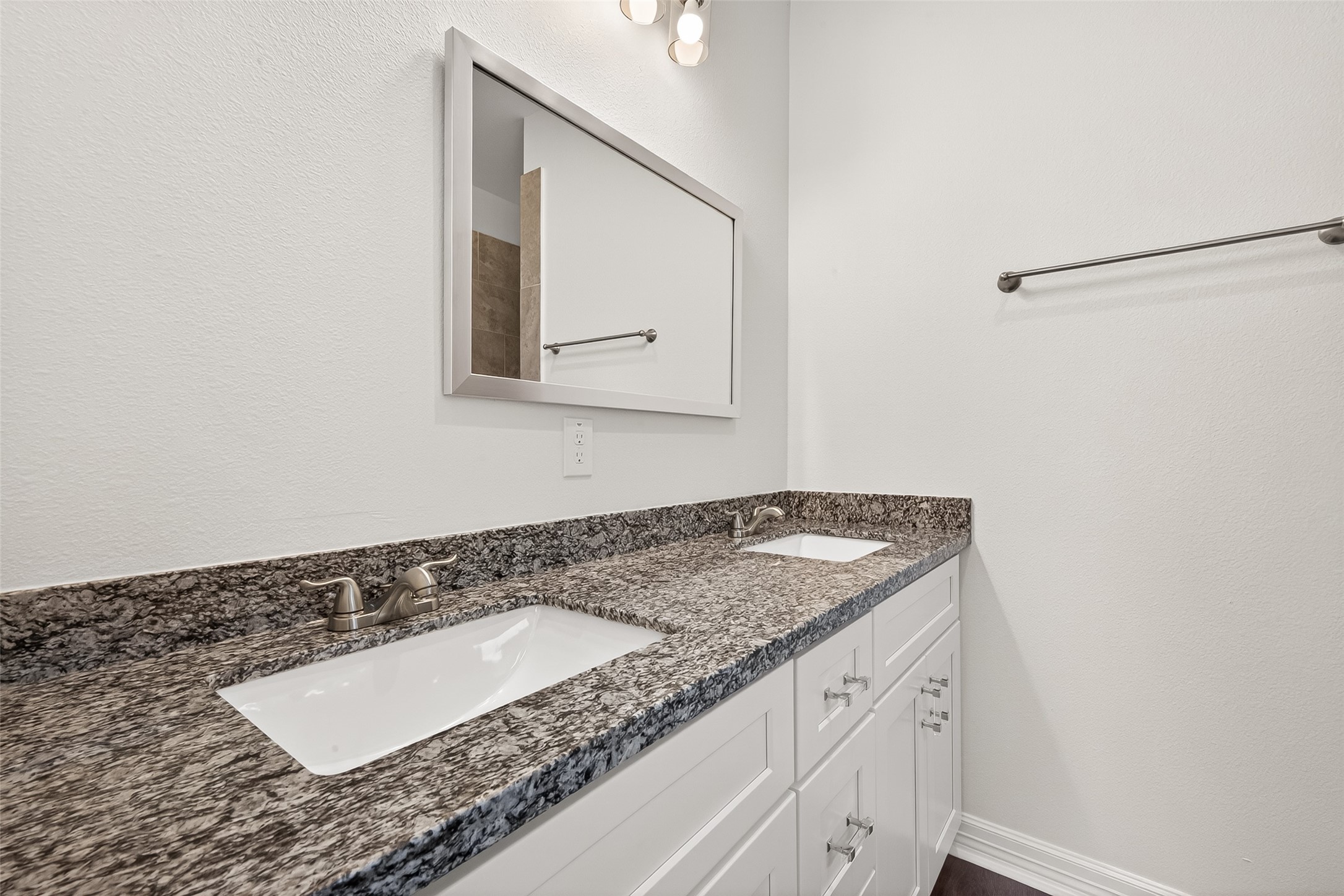 422 North 4th Street Beasley, TX 77417 - Photo 24 of 25 a bathroom with a granite countertop sink and a mirror