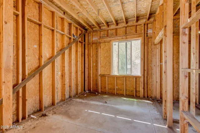 a view of a room with wooden walls