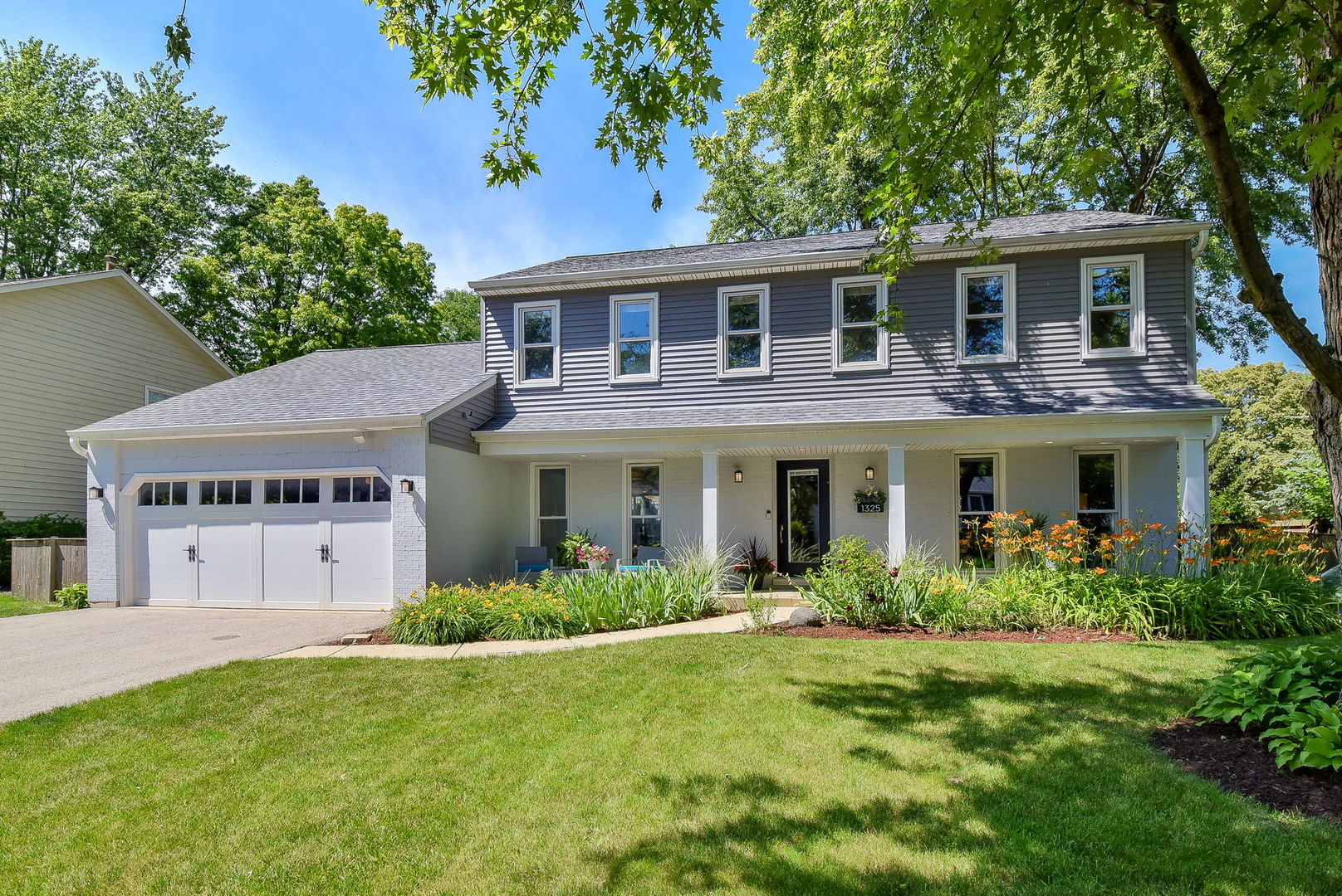 1325 Culpepper Drive Naperville, IL 60540 - Photo 1 of 34 a front view of house with yard and green space