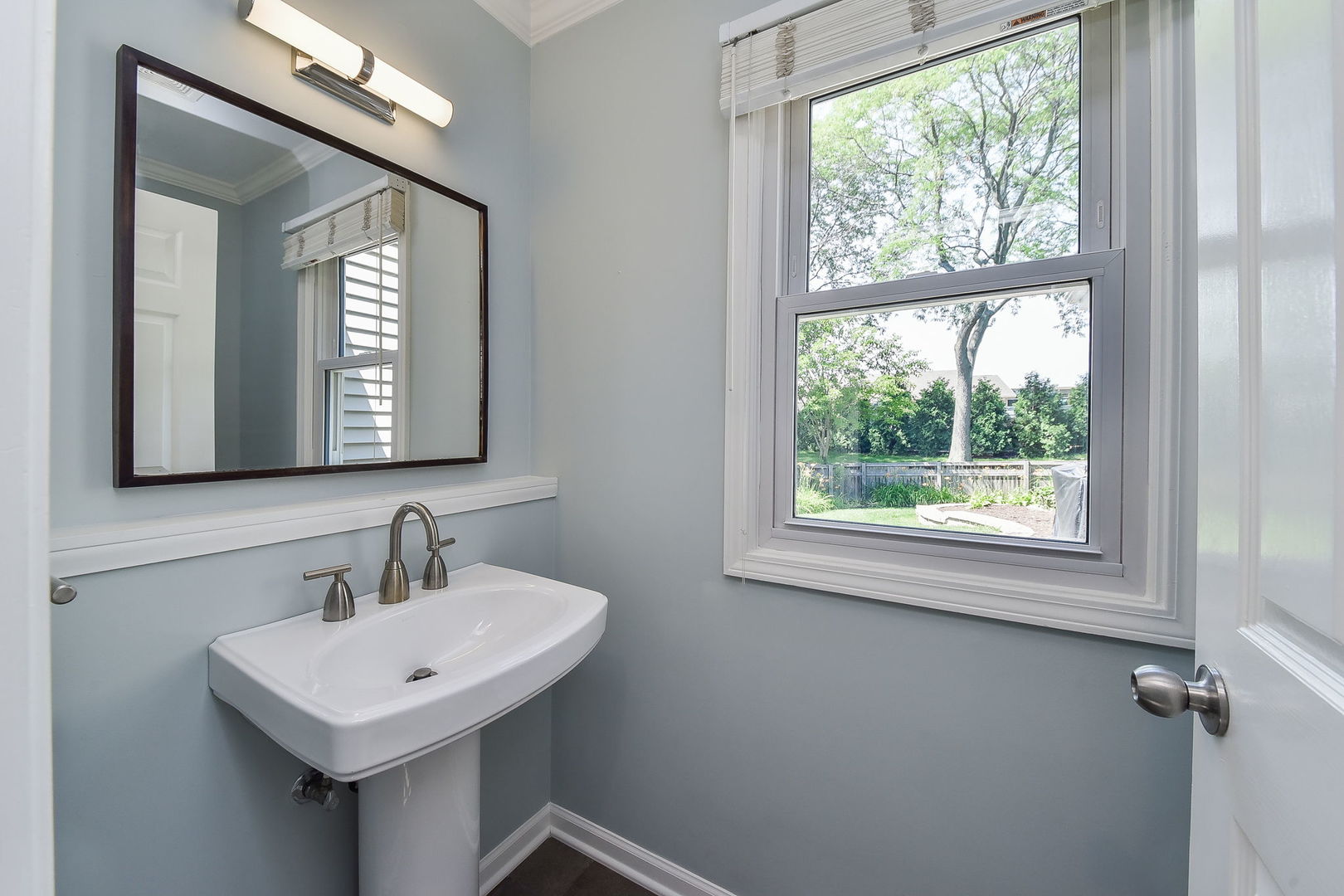 1325 Culpepper Drive Naperville, IL 60540 - Photo 13 of 34 a bathroom with a sink and a mirror