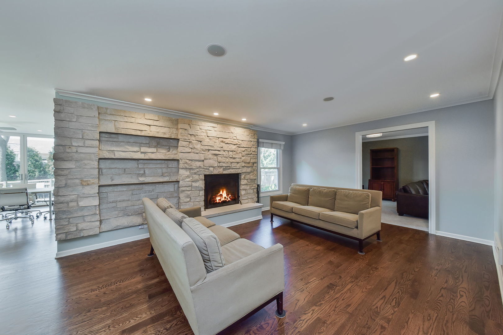 1325 Culpepper Drive Naperville, IL 60540 - Photo 15 of 34 a living room with furniture and a fireplace