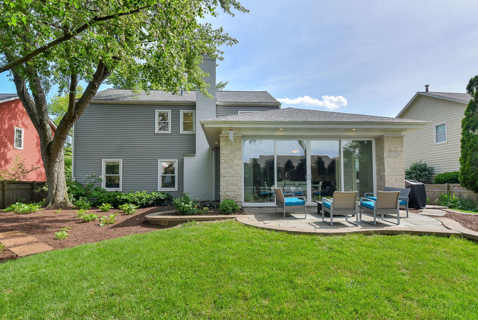 1325 Culpepper Drive Naperville, IL 60540 - Photo 30 of 34 a front view of house with yard and outdoor seating