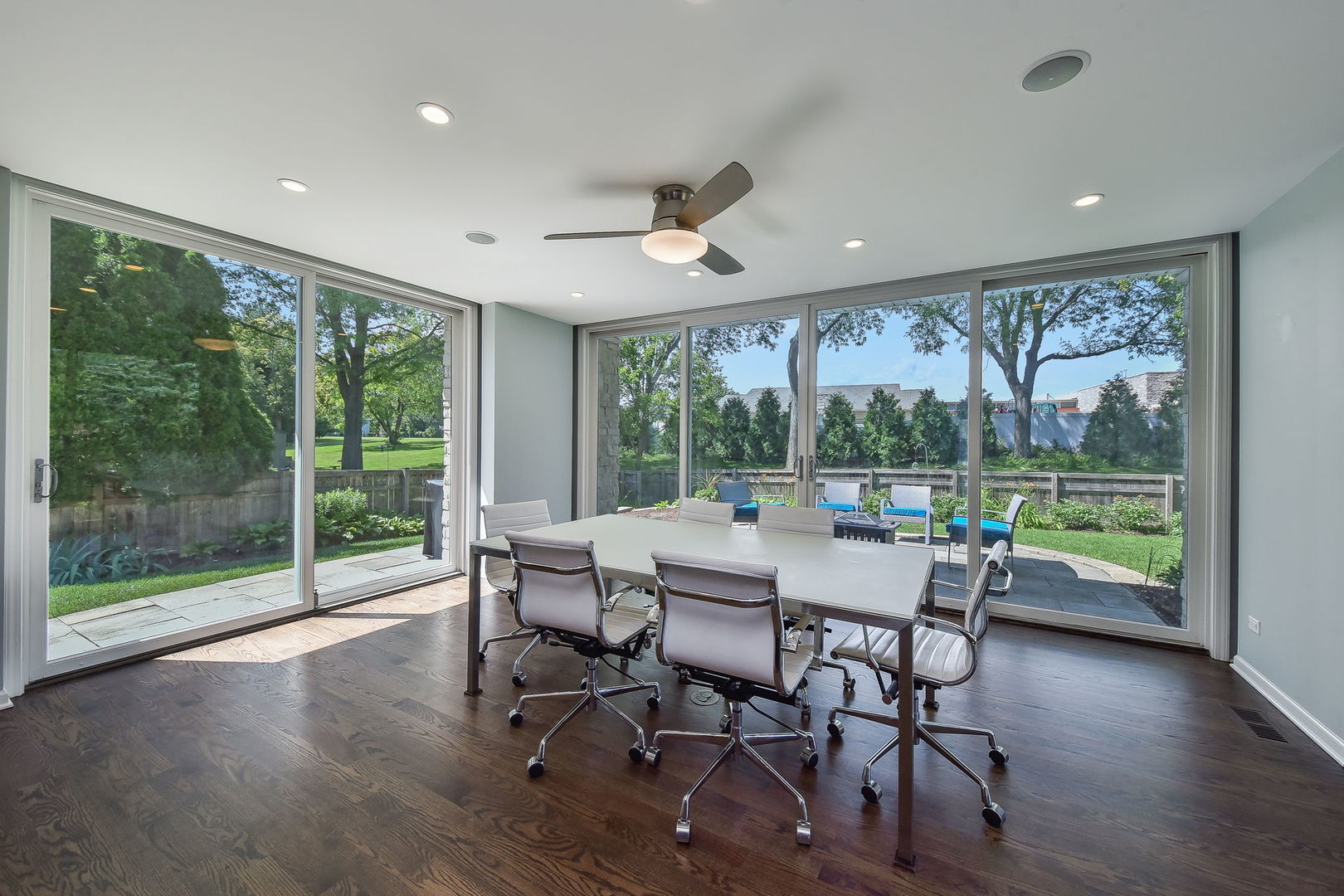 1325 Culpepper Drive Naperville, IL 60540 - Photo 10 of 34 a dining room with furniture window and wooden floor