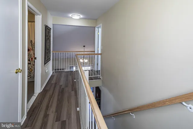 a view of balcony with wooden floor