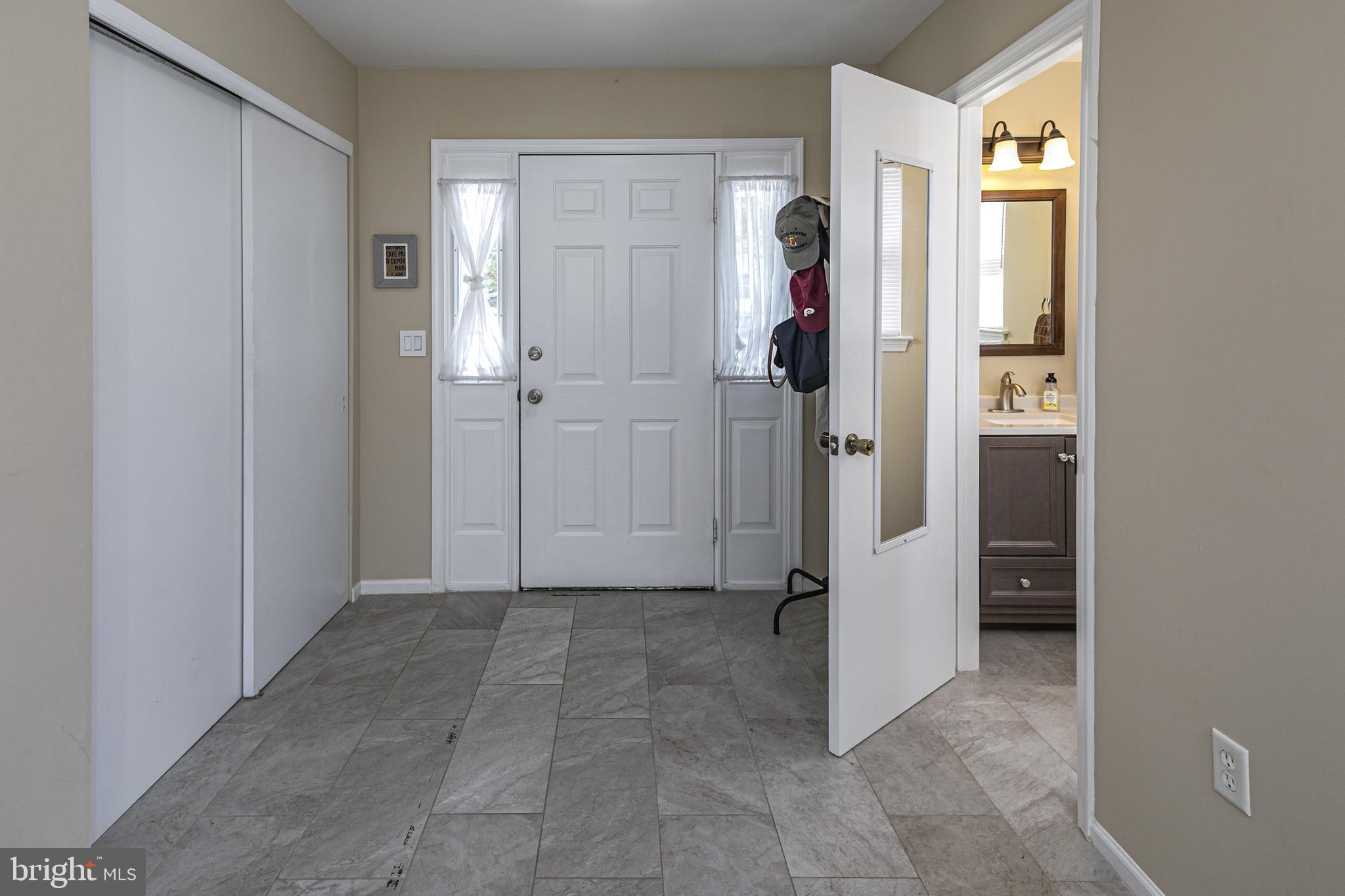 27 Richards Road Lawrence Township, NJ 08648 - Photo 5 of 43 Half Bath off Tiled Foyer