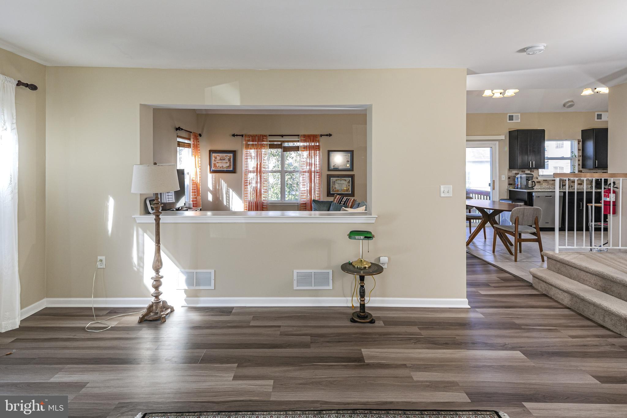 27 Richards Road Lawrence Township, NJ 08648 - Photo 8 of 43 Living Room with Opening to Family Room & Dining