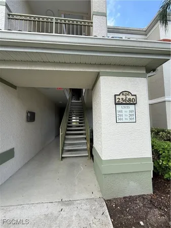 a living room with furniture and a yard