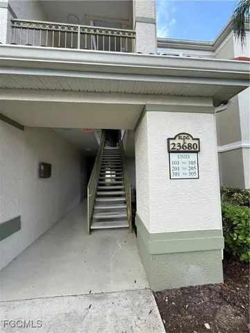 a living room with furniture and a yard