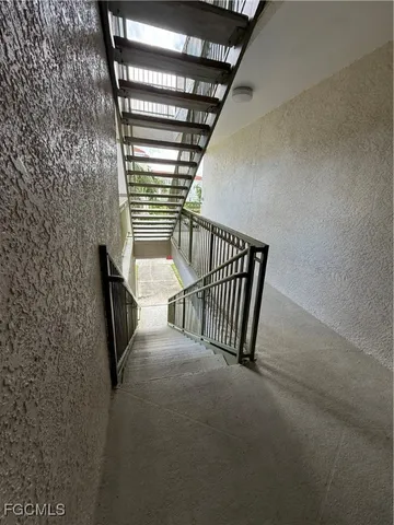 a view of an empty room with a bathroom