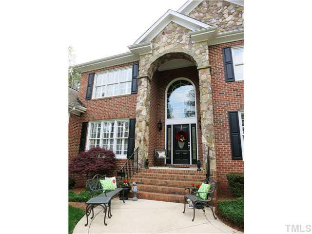 7209 Sparhawk Road Wake Forest, NC 27587 - Photo 24 of 25 This home features an all brick & stone exterior, hardwood flrs, 9' ceilings & deep crown molding throughout the main level, an open floor plan & Security System!