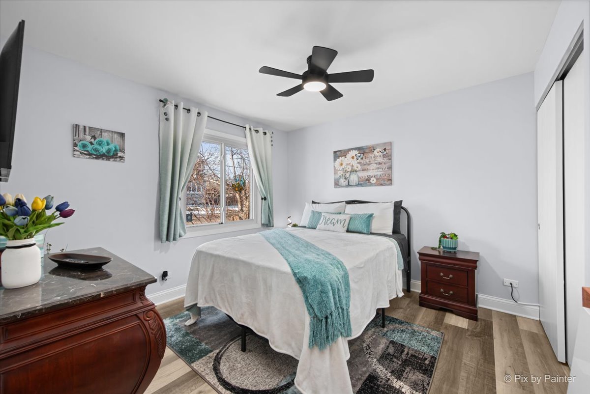 920 Mensching Road Roselle, IL 60172 - Photo 19 of 40 a bedroom with a bed and a window
