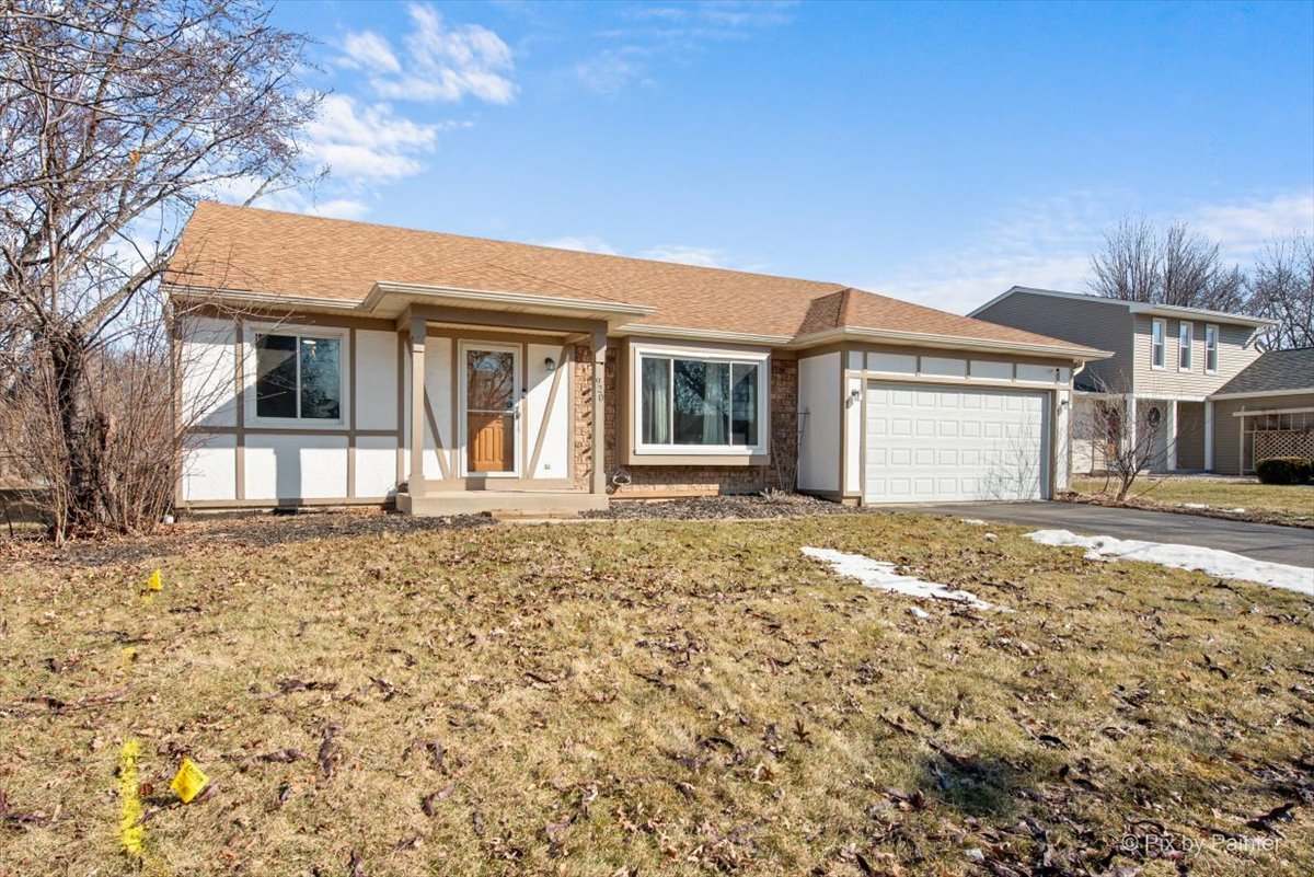 920 Mensching Road Roselle, IL 60172 - Photo 2 of 40 front view of a house with a yard