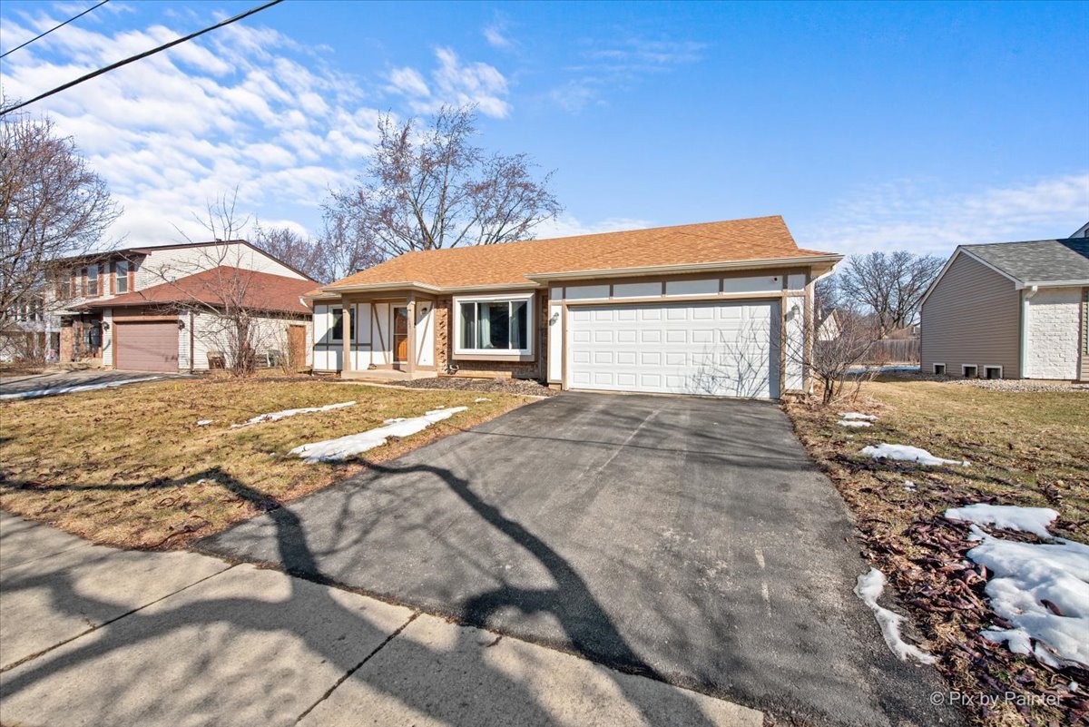 920 Mensching Road Roselle, IL 60172 - Photo 3 of 40 a house view with a outdoor space