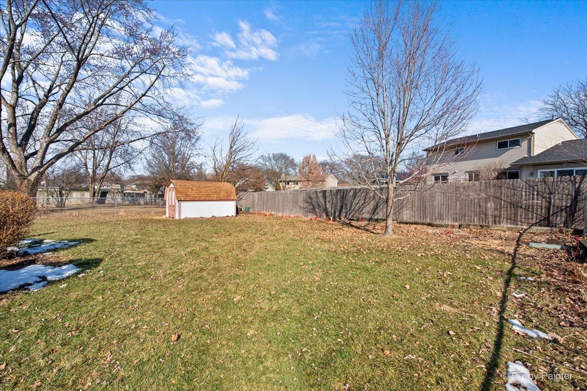 920 Mensching Road Roselle, IL 60172 - Photo 37 of 40 a view of a yard with a tree