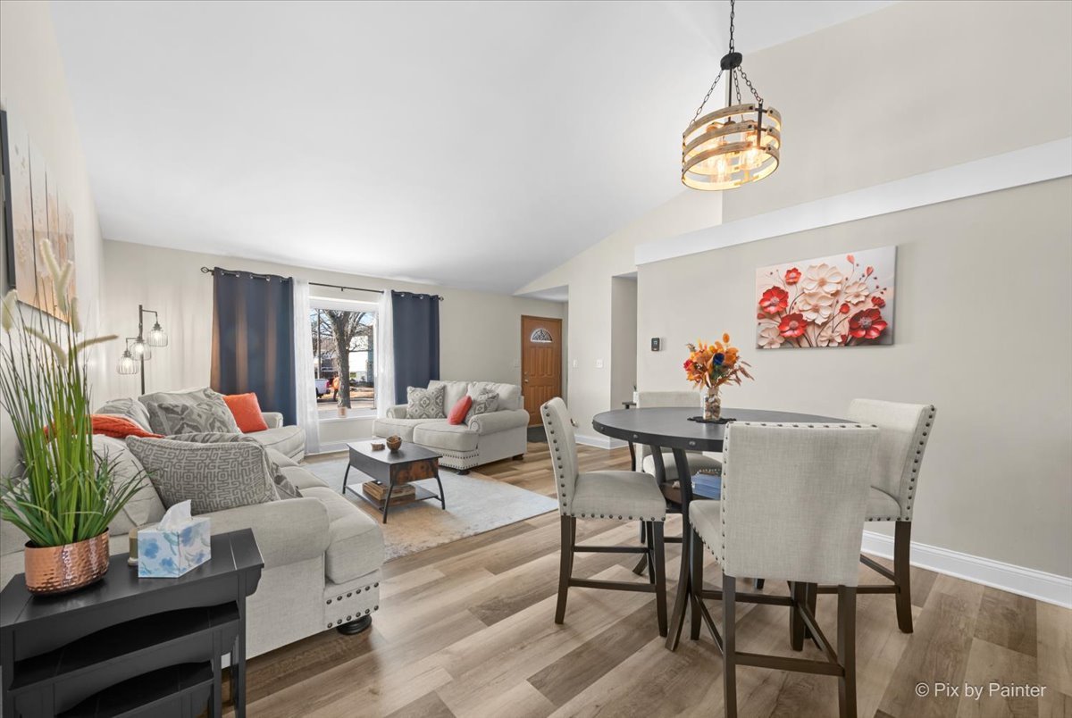 920 Mensching Road Roselle, IL 60172 - Photo 6 of 40 a living room with furniture and a table