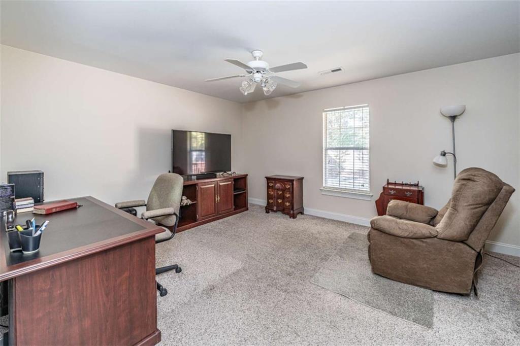14 Limon Place Southwest Rome, GA 30165 - Photo 18 of 27 a living room with furniture and a window