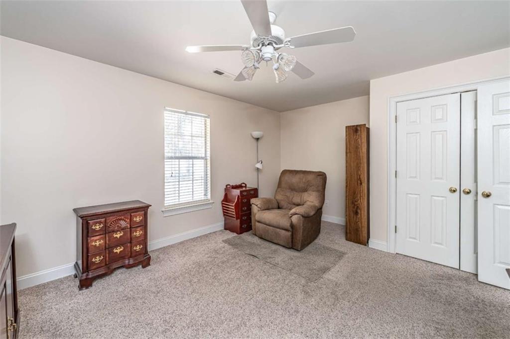 14 Limon Place Southwest Rome, GA 30165 - Photo 19 of 27 a living room with furniture and a window