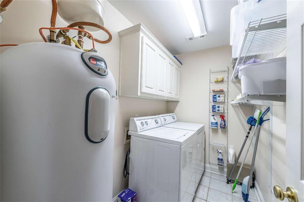 14 Limon Place Southwest Rome, GA 30165 - Photo 23 of 27 a utility room with dryer and washer