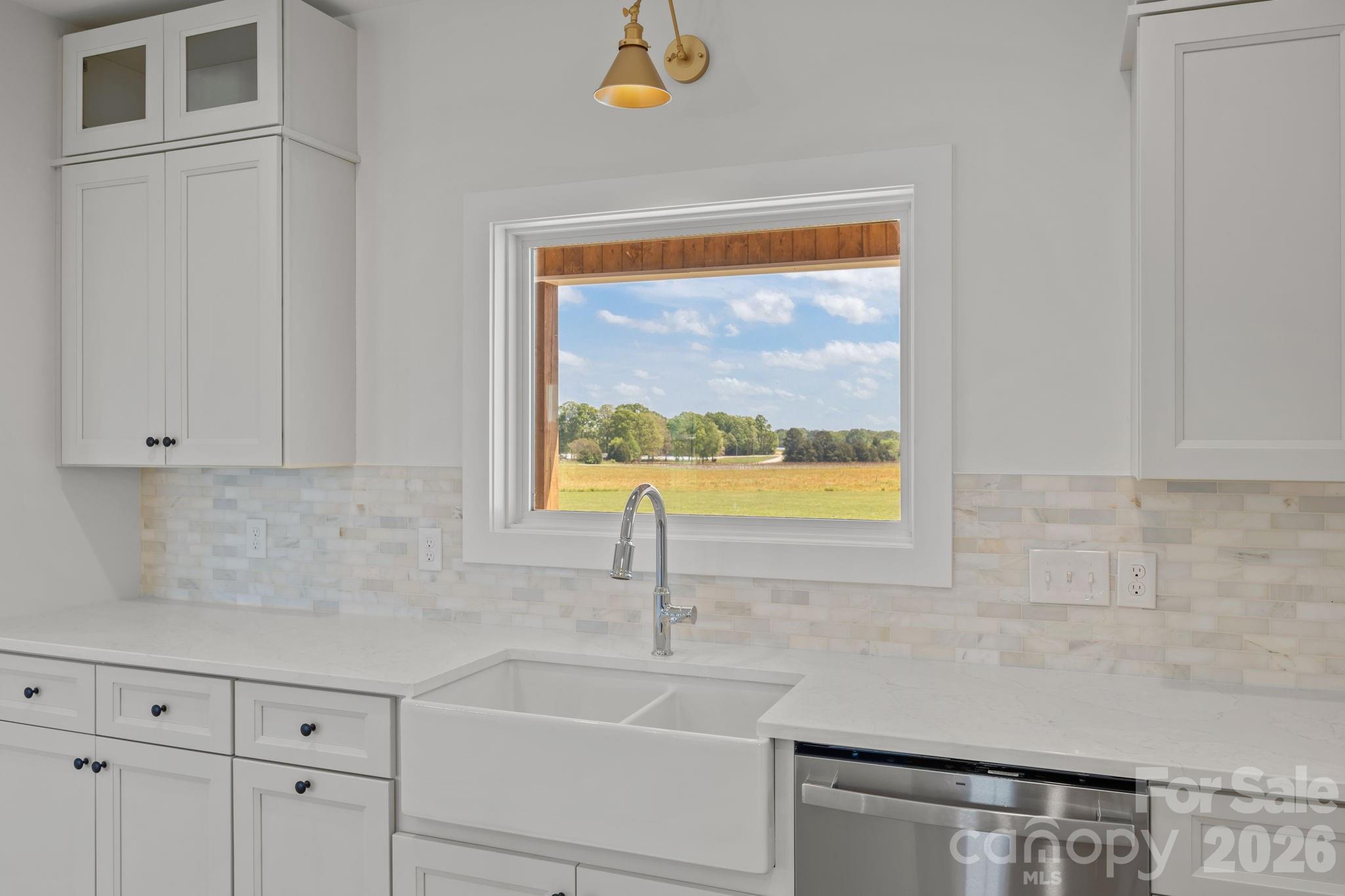 4805 Patterson Road China Grove, NC 28023 - Photo 20 of 42 a kitchen with a sink and a window