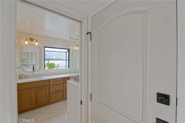 a bathroom with a sink and a shower