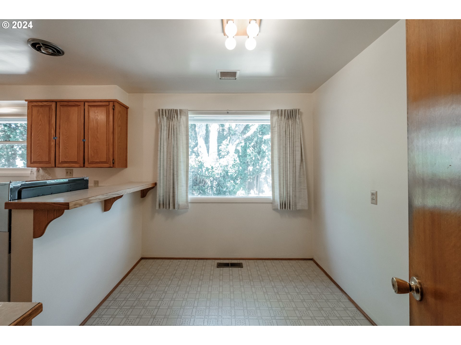 1620 Market Street Springfield, OR 97477 - Photo 18 of 31 a kitchen with a refrigerator and a sink