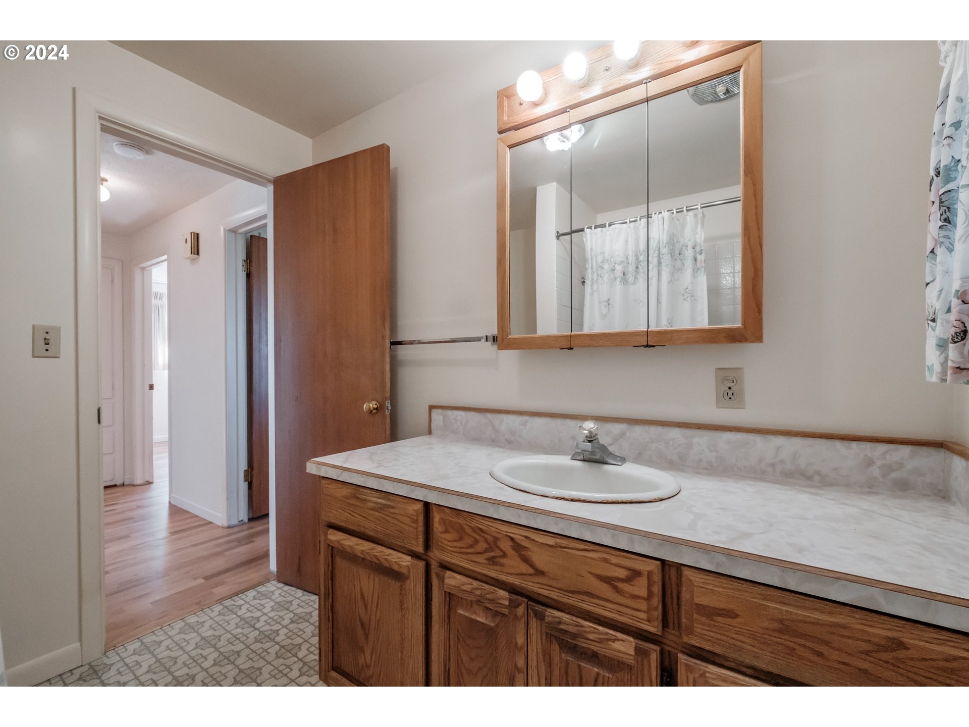 1620 Market Street Springfield, OR 97477 - Photo 21 of 31 a bathroom with a sink and a mirror