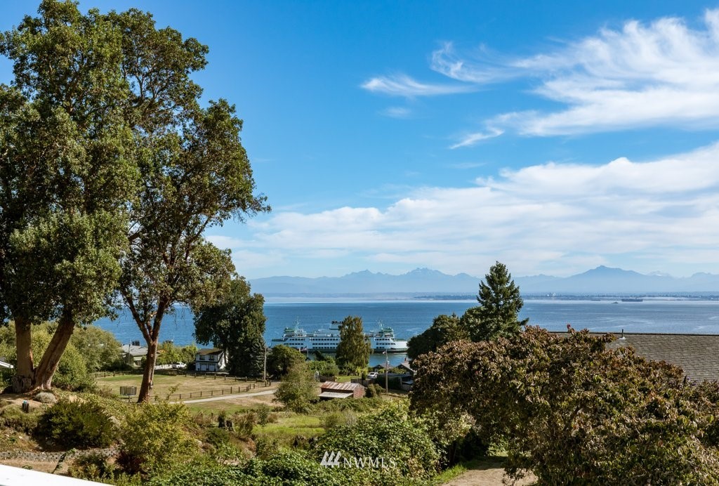 6623 Humphrey Road Clinton, WA 98236 - Photo 4 of 40 a view of a lake with houses