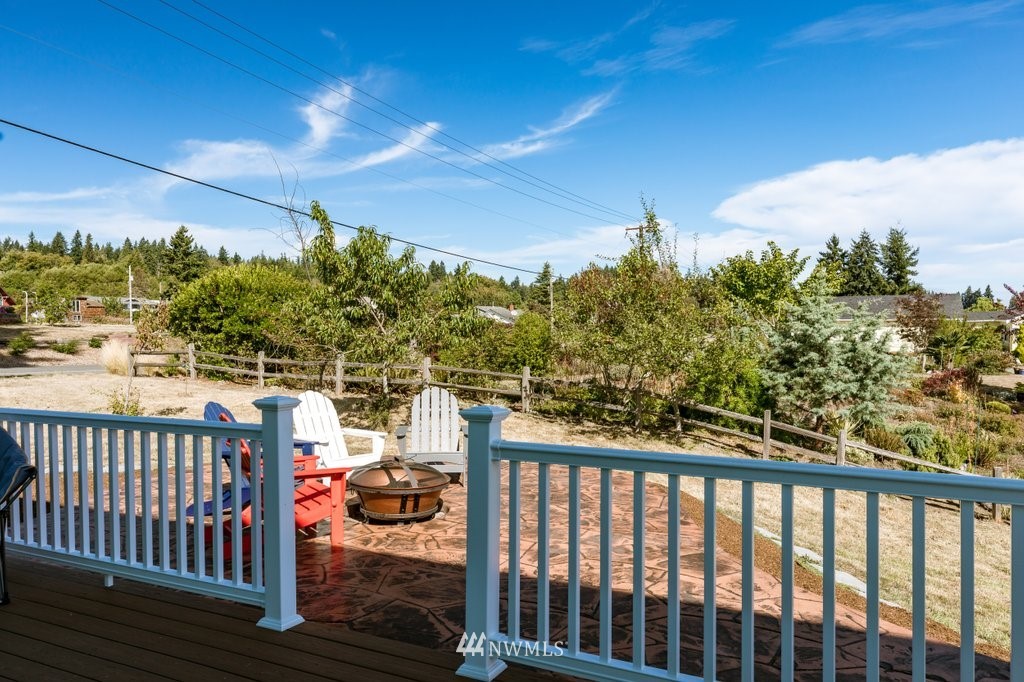 6623 Humphrey Road Clinton, WA 98236 - Photo 9 of 40 a view of a balcony with cars parked