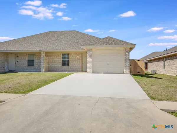 a view of outdoor space yard and garage