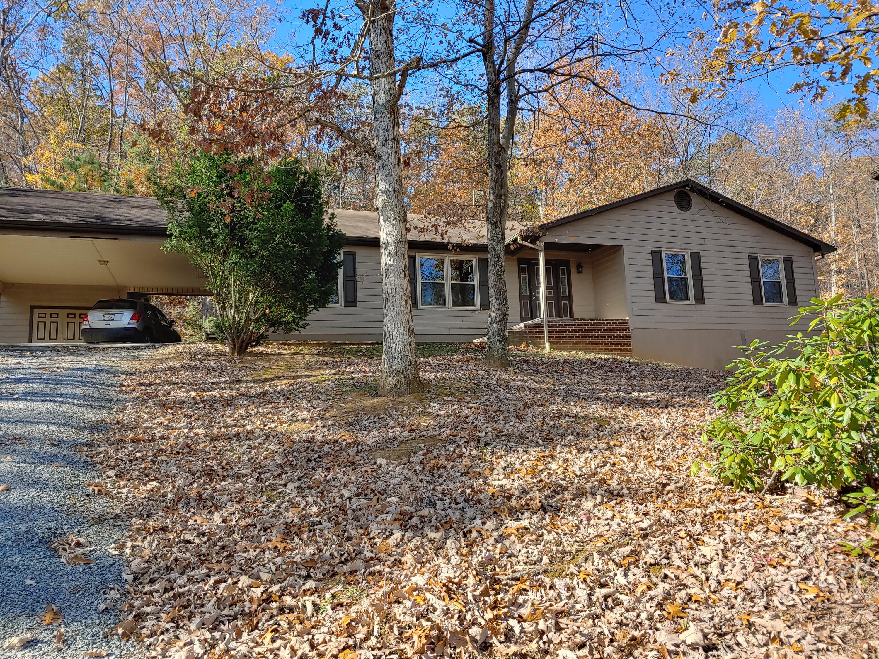 36 Rainbow Forest Drive Blue Ridge, VA 24064 - Photo 1 of 37 a house that has a tree in front of it