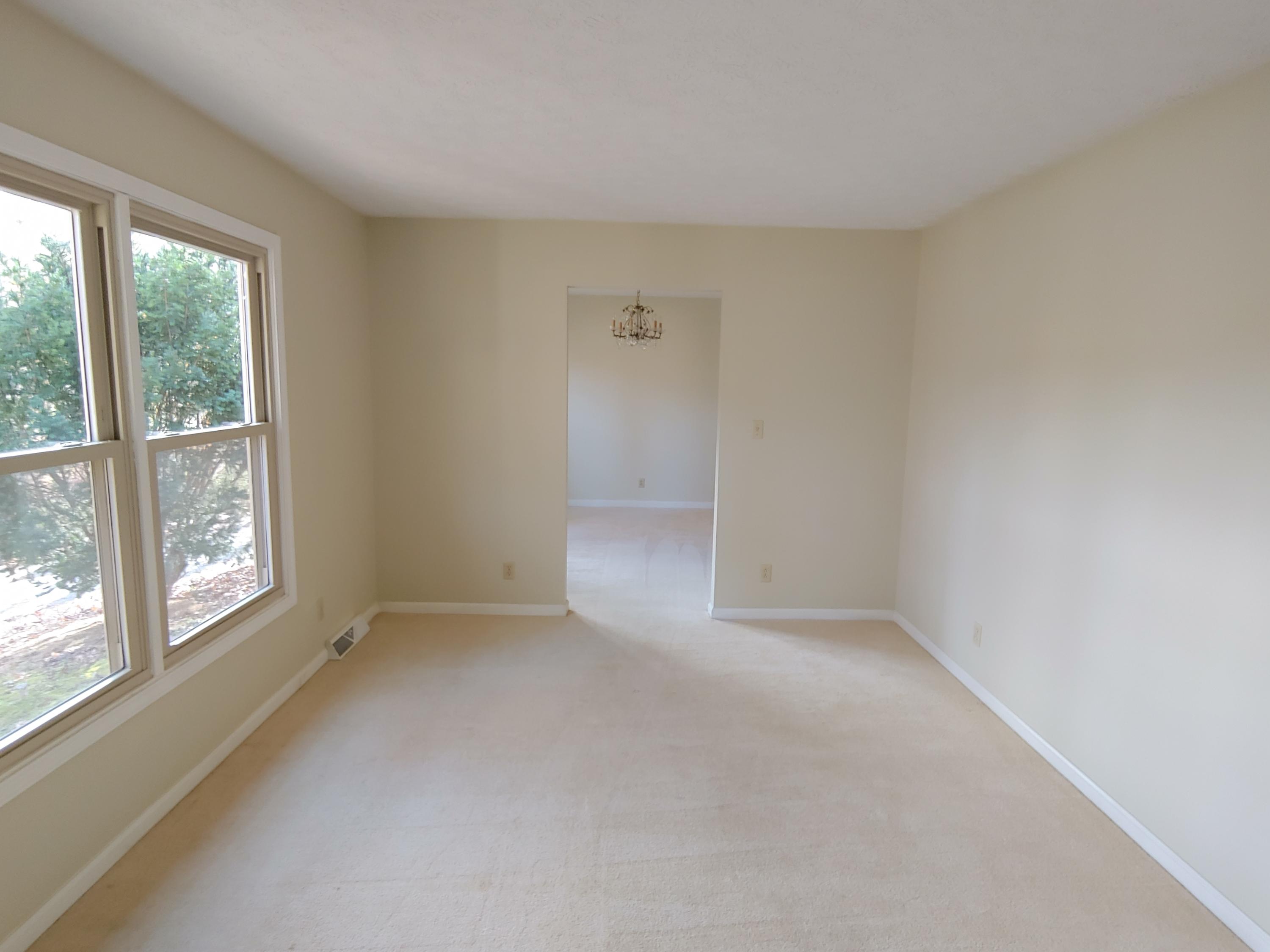 36 Rainbow Forest Drive Blue Ridge, VA 24064 - Photo 4 of 37 a view of an empty room with a window