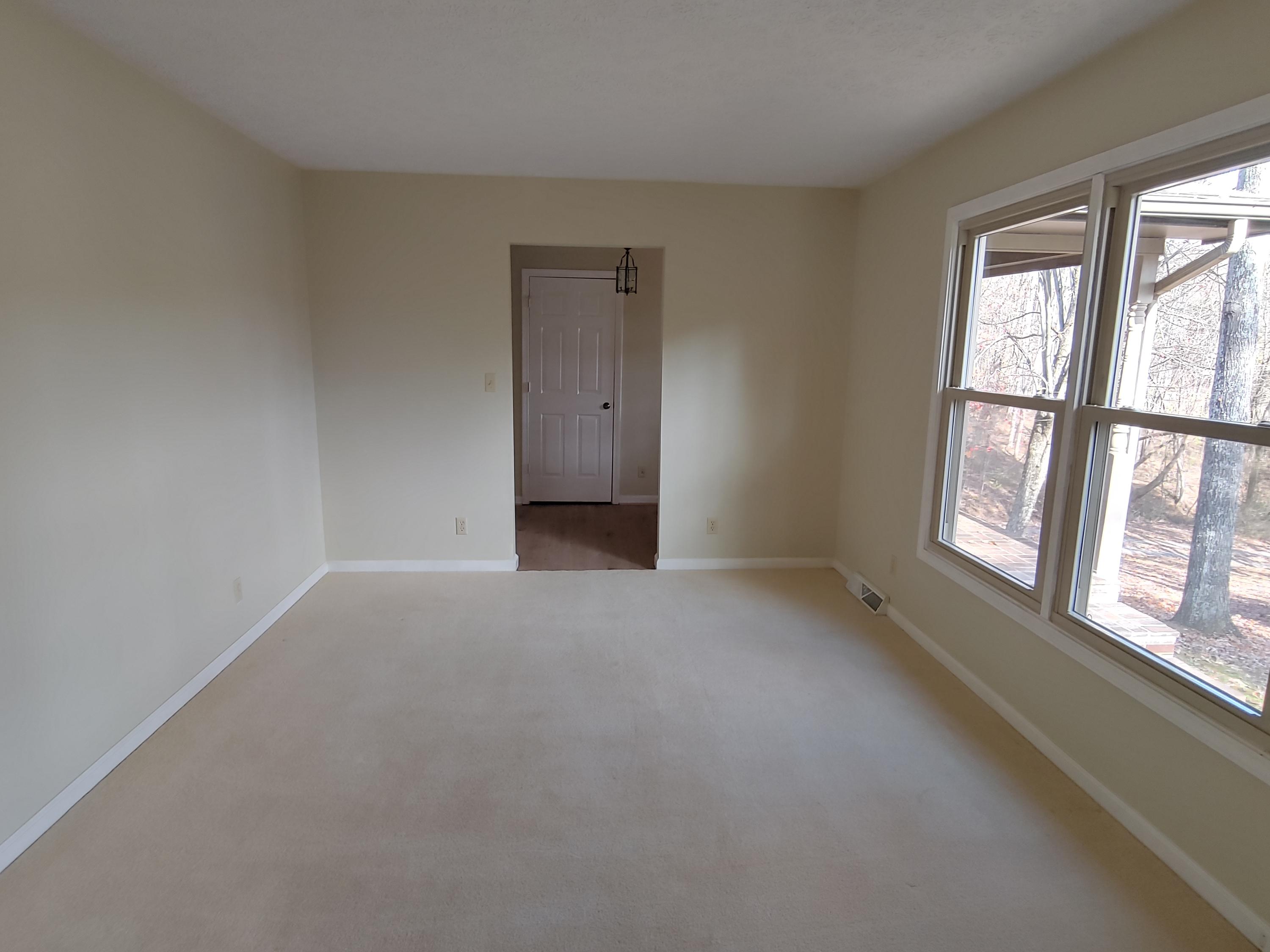 36 Rainbow Forest Drive Blue Ridge, VA 24064 - Photo 5 of 37 an empty room with windows and closet