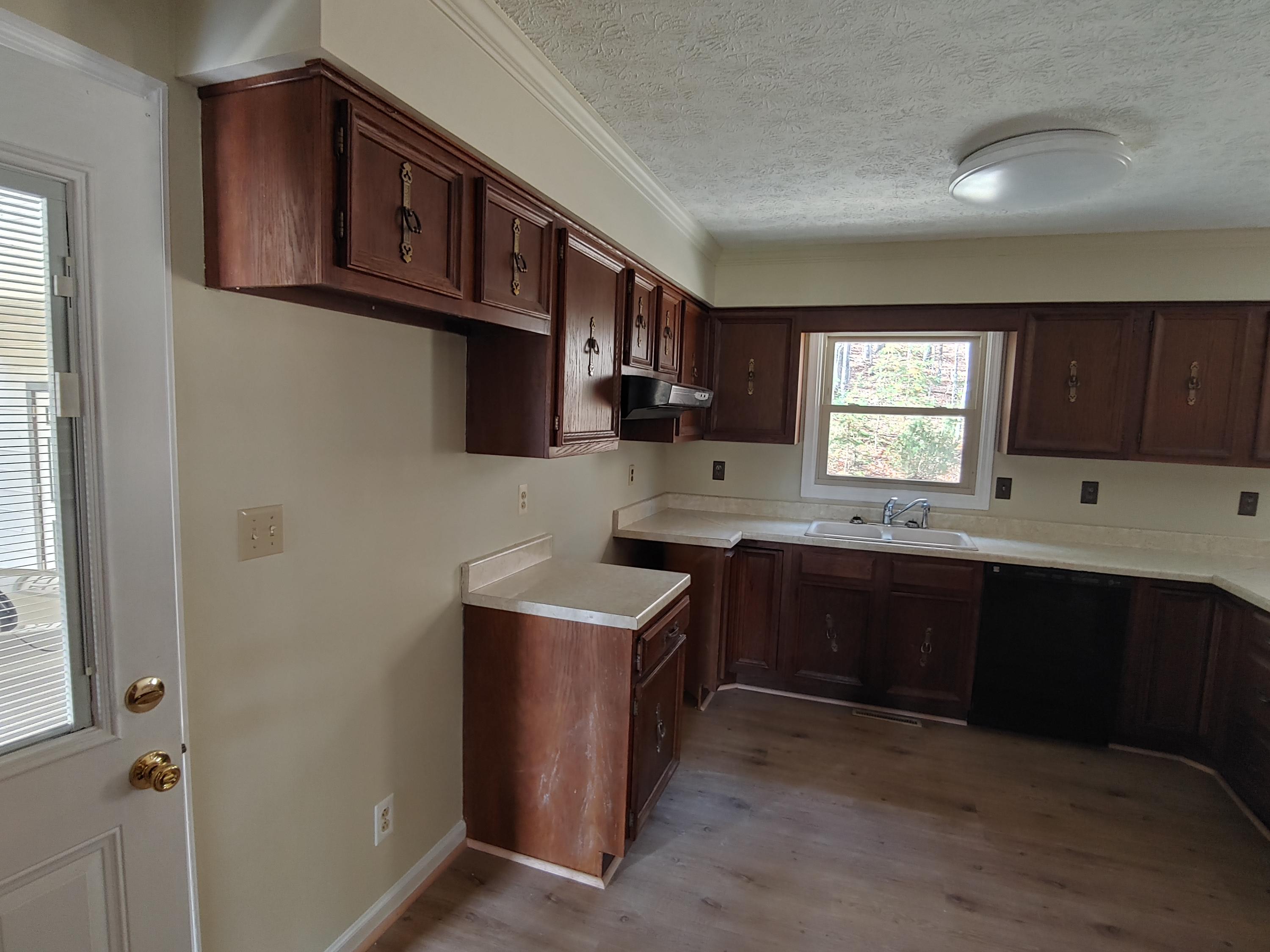 36 Rainbow Forest Drive Blue Ridge, VA 24064 - Photo 9 of 37 a kitchen with stainless steel appliances granite countertop a stove a sink dishwasher and a microwave oven with cabinets