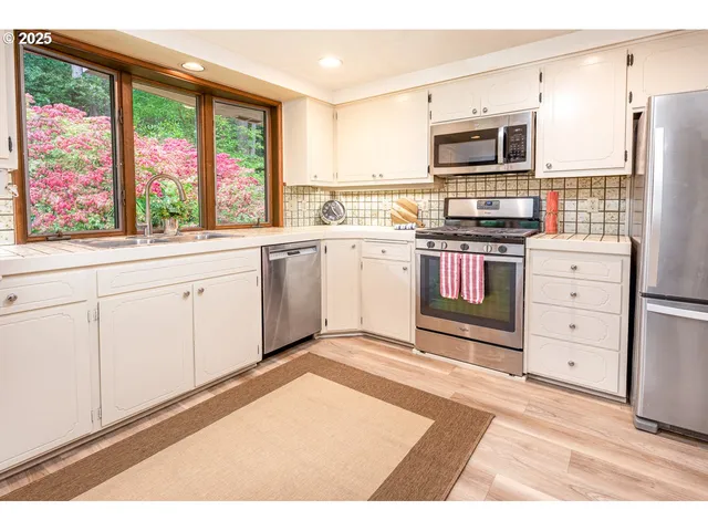 a view of a kitchen with a window