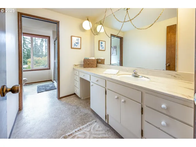 a bathroom with a sink a toilet and a bathtub
