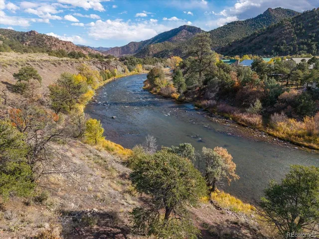 a view of a big yard with an outdoor space