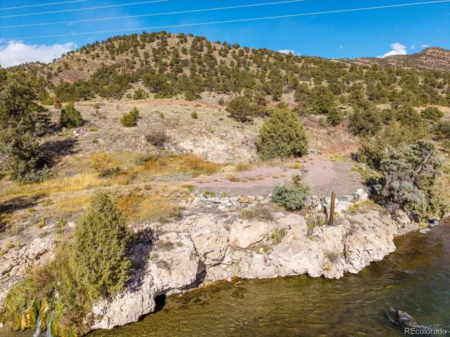 a view of a yard with a mountain