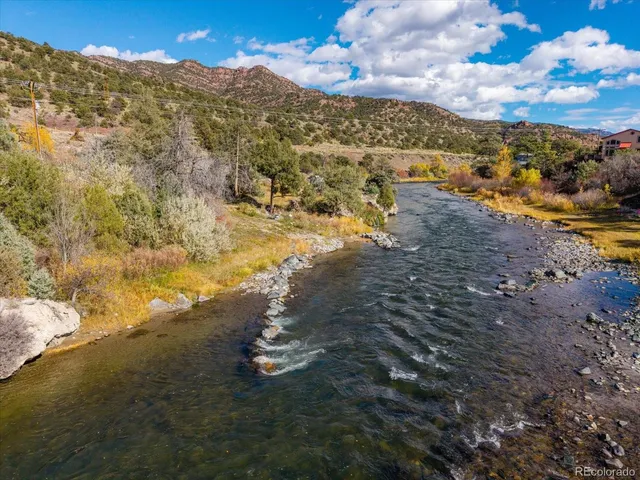 a view of beach and yard