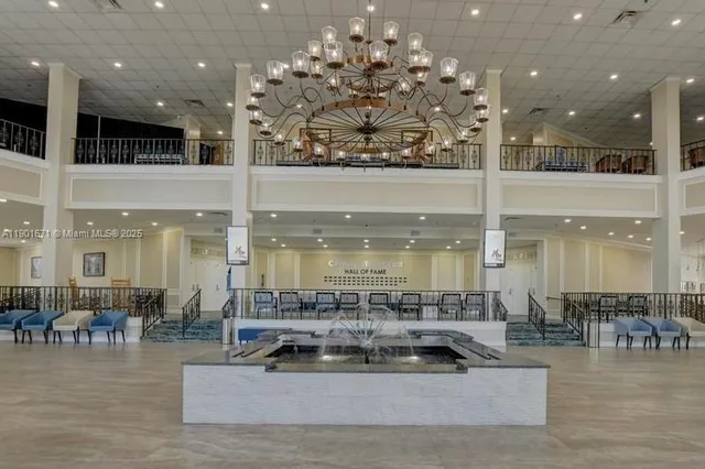 a view of swimming pool with outdoor seating