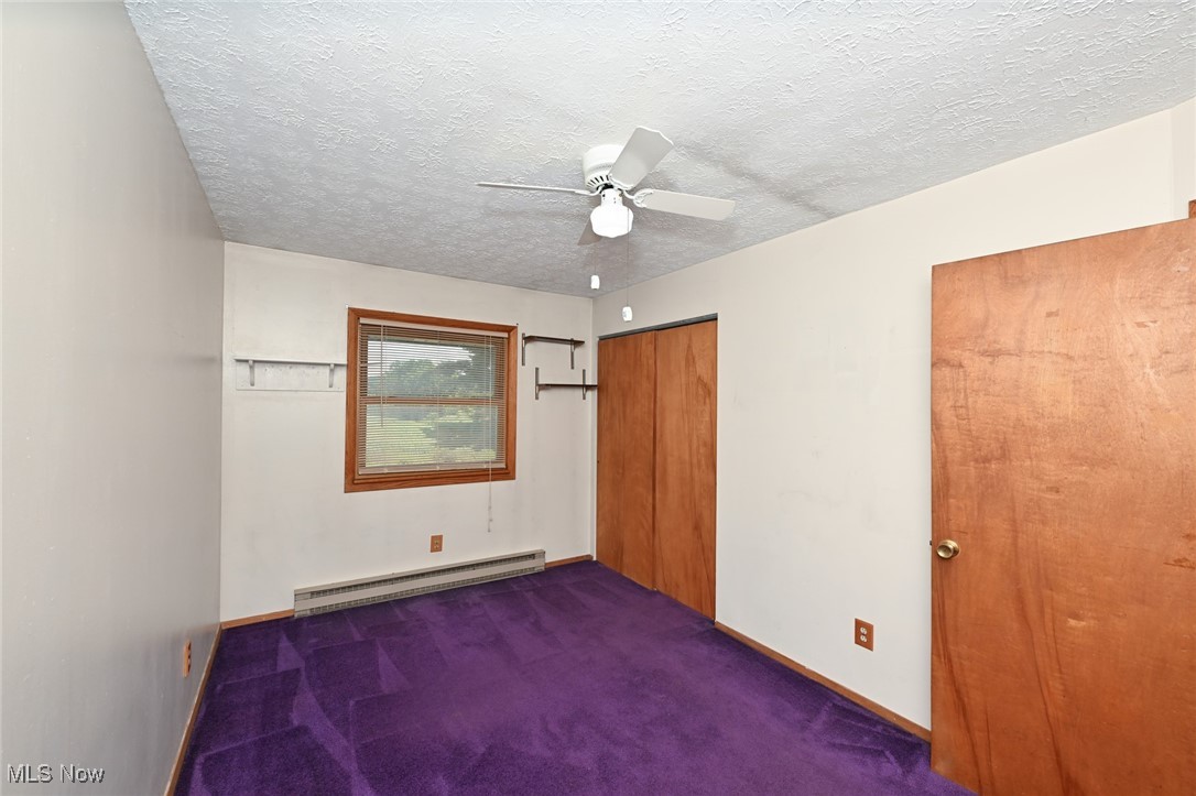 3079 Stroup Road Atwater, OH 44201 - Photo 28 of 40 Welcome to 3079 Stroup Rd, Atwater, OH 44201-9105 - The third main floor bedroom with a good-sized closet. The window overlooks the front yard.