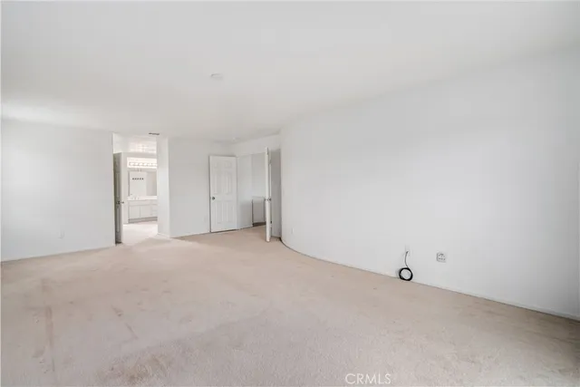 a large white room with closet
