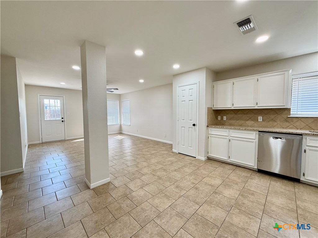 210 Stone Gate Drive Victoria, TX 77904 - Photo 10 of 23 a view of a kitchen with a sink and cabinets